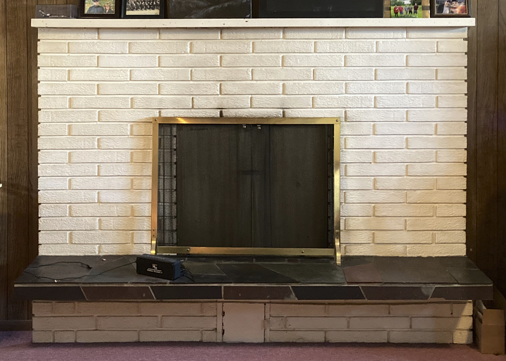 Dirty old brick fireplace