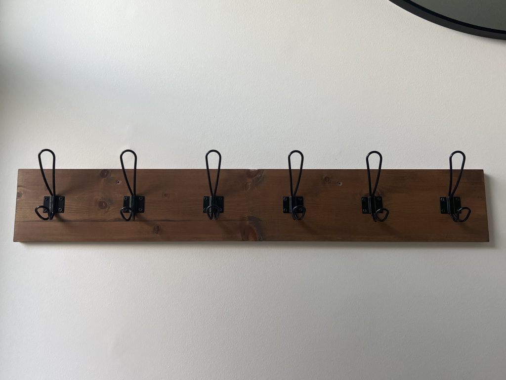 Rustic Coat rack hanging on wall