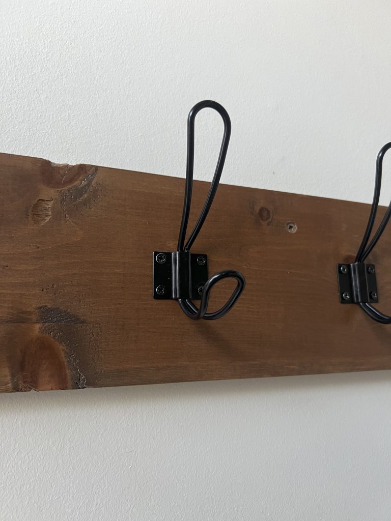 Close up shot of matte black farmhouse style coat hook